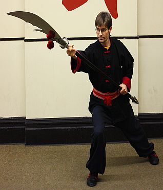 Kung Fu students demos a Quan Do Chinese Weapon